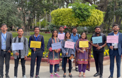 group of students with thank you signs